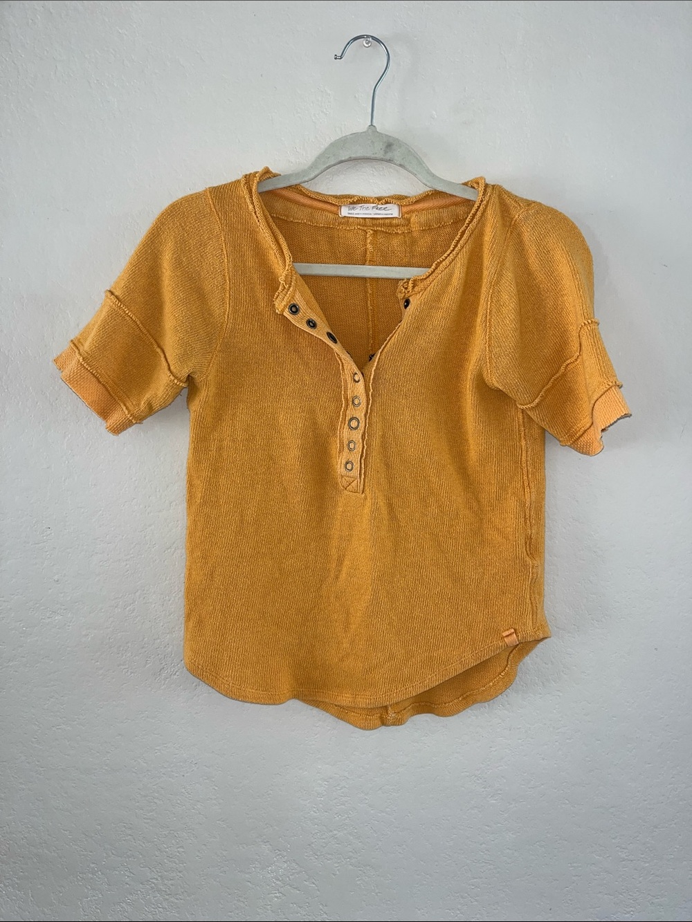 We The Free Short-Sleeve Henley Crop Top in Orange.